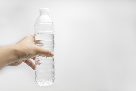 Holding Water bottleの写真素材