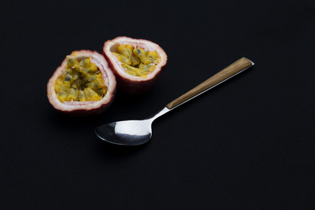 Passion fruit on back backgroundsの写真素材