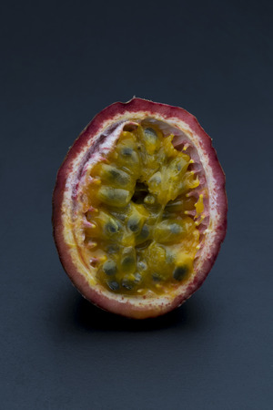 Passion fruit isolated on back backgroundの写真素材