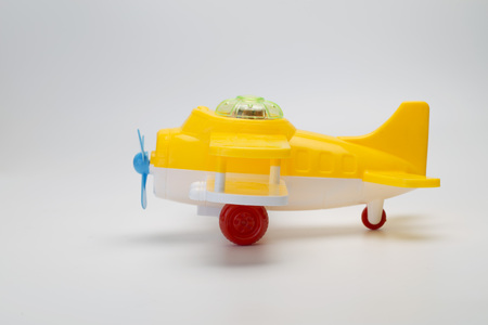 Toy airplane on white backgroundの写真素材