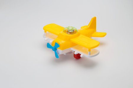 Toy airplane on white background