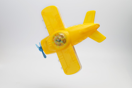 Toy airplane on white backgroundの写真素材