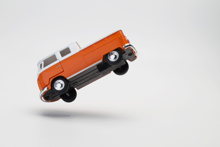 Toy truck floating in the airの写真素材