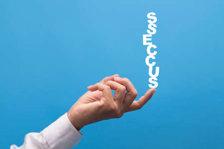 Businessman using the fingertip pushed the success message up. Business concept.の写真素材