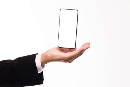 Businessman show display of smartphone with blank screen.の写真素材