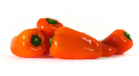 orange-colored peppers in full bloomの写真素材