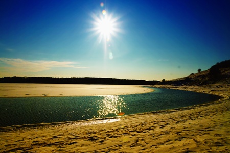 Nice river in sunny winter landscape under a deep blue sky                               の写真素材