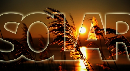 SOLAR written fine on a sunset background - ideal for more atmosphere on your website or presentationの写真素材