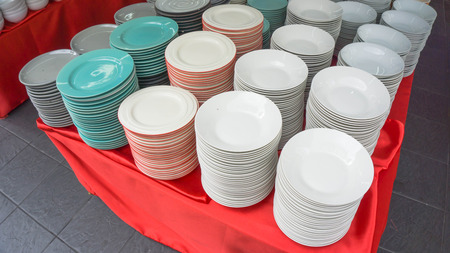 white dish in a rowの写真素材