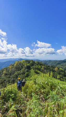 hiking with a backpack and mountain panorama, Chiangmai Thailandの写真素材