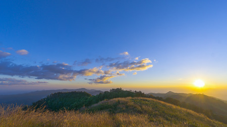 Sunrise over the mountain range,Chiangmai Thailandの写真素材