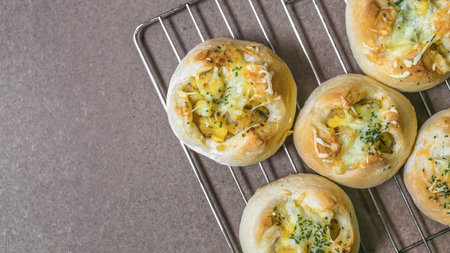 Fresh bread from oven (anchovy potato bread)の写真素材