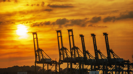 containers loading shipping crane at morningのeditorial素材