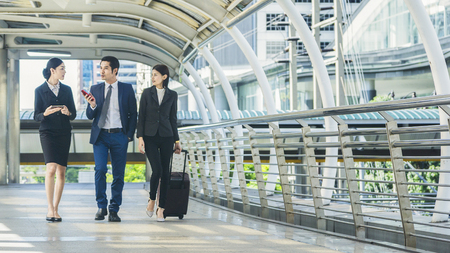 business people walk outdoor pedestrian walkwayの写真素材