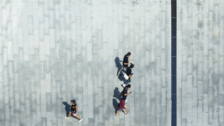 top aerial view of people walk on pedestrian street cityの写真素材