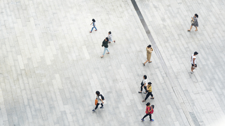 people walk on across business city street (Aerial top view)の写真素材