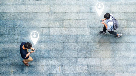 Aerial top view with blur man with smartphone walking with busy city crowd move to pedestrian...
