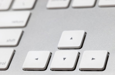 close up of a white keyboard english alphabet.