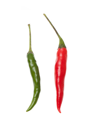 Green and red chili pepper isolated on a white background.の写真素材