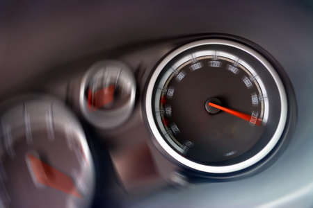 Dashboard (speedometer and tachometer close-up)  with motion gauges. Speed Concept.の写真素材