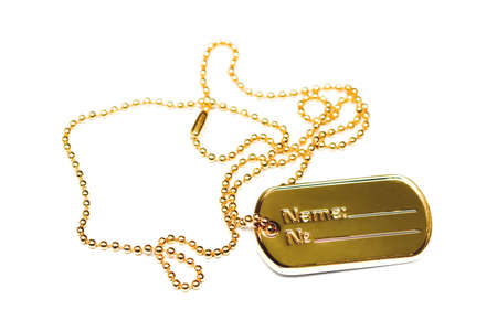 Golden dogtag. Photo isolated on white background.の写真素材