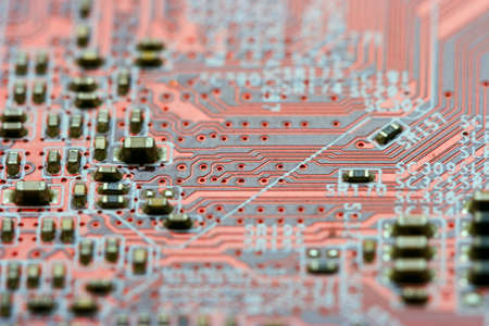 Electronic circuit board closeup photo. Selected focus on center.の写真素材
