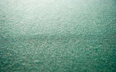 Green fabric background. Selected focus.の写真素材