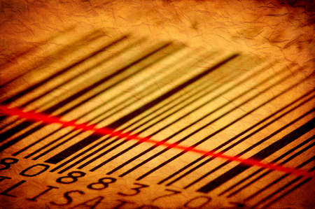 grunge barcode label on a brown parchment patternの写真素材