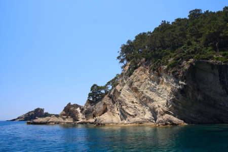 Mediterranean rocky coast in summer day. Clear sky.の写真素材