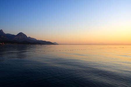 Mediterranean seascape in in the early morning. Mountains on background.の写真素材