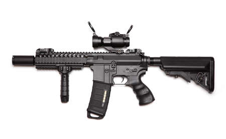 Custom build compact size M4A1 assault carbine with RIS/RAS, tactical handguard, crane stock and red-dot sight. Isolated on a white background. Weapon series.の写真素材