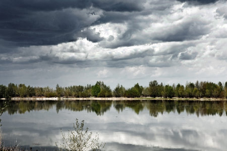 River and clouds. Spring landscape.の写真素材