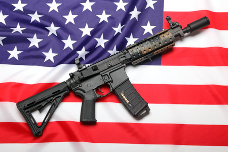 AR-15 (M4A1) custom carbine on the flag of USAの写真素材