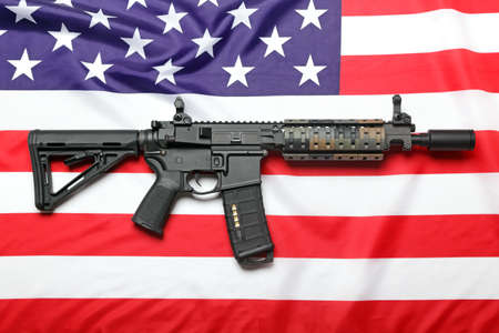 The "Black Rifle" AR-15 carbine and the flag of USAのeditorial素材