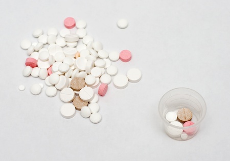 lot of different pills on gray backgroundの写真素材