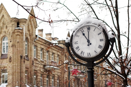 street clock in the snowの写真素材