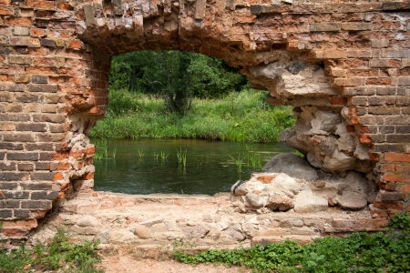 ruins. old building. hole in the brick wallの写真素材
