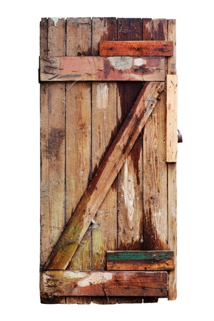 Old decayed wooden door. Isolated on white with clipping pathの写真素材