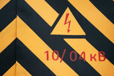 warning symbol on doors of the transformer substationの写真素材