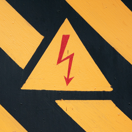 warning symbol on doors of the transformer substationの写真素材