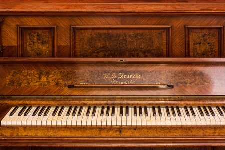 Piano keys of an old German piano close upの写真素材