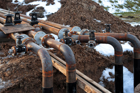 Steel fuel pipes and valves at the oil refinery