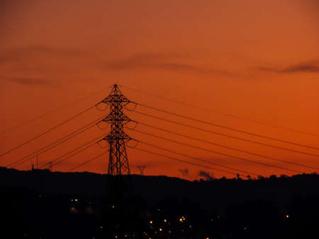 Electricity pylons in the mountainsの写真素材