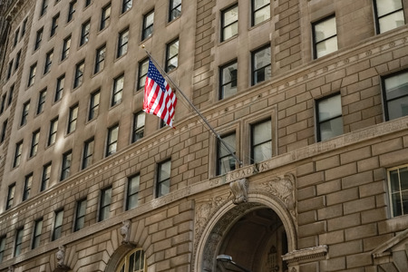 New York, USA - October 15, 2015: American flag on the wall of a bank in New Yorkのeditorial素材