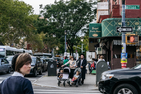 New York, USA - September 22, 2015: Jewish hassidic pair cross the street.のeditorial素材