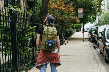 Chicago, USA - September 25, 2015: Tourist and bicycle on a lane.のeditorial素材