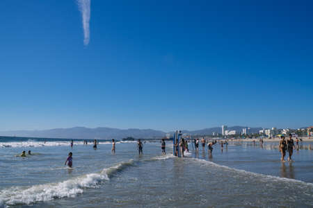 Los Angeles, USA - September 27, 2015: People are walking on Venice beach, California.のeditorial素材