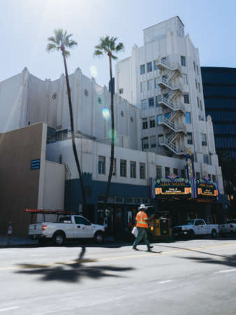 Los Angeles, USA - September 27, 2015: Man worker is going on the street of Los Angeles near Saban Theatre.のeditorial素材