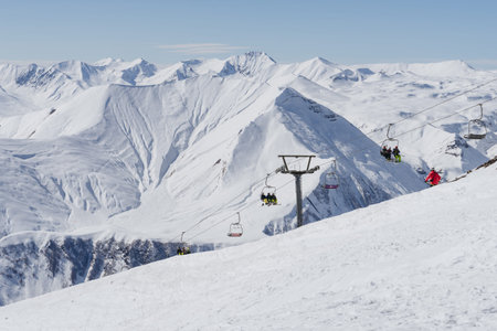 Gudauri, Georgia - February 16, 2016: People climb the ski lift of Gudauri, Georgia.のeditorial素材