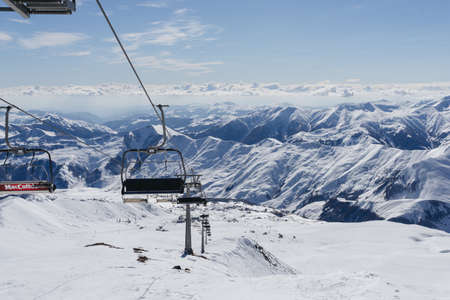 Gudauri, Georgia - February 16, 2016: People climb the ski lift of Gudauri, Georgia.のeditorial素材